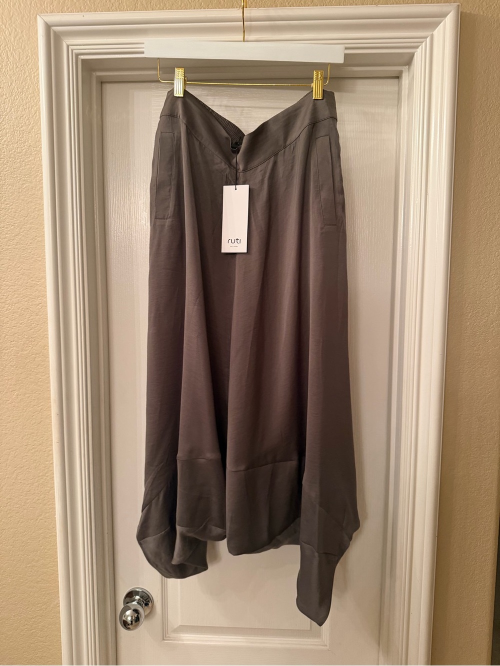 Ruti Wide-Leg Asymmetric Hem Pants in silky rich seastone color